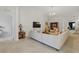 Bright, open living room showcasing a comfortable sofa, accent chairs, and seamless flow to other living spaces at 2679 Metro Sevilla Dr # 101, Orlando, FL 32835