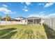 A well-maintained backyard and screened patio at 2951 Irish Peach Dr, Winter Garden, FL 34787