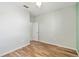 Clean bedroom with wood-look tile floors, a ceiling fan, and an open feel at 2951 Irish Peach Dr, Winter Garden, FL 34787