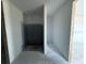 A walk-in closet featuring a concrete floor at 30125 Misty Pines Rd, Mount Dora, FL 32757