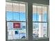 Dual windows let light into the room at 30125 Misty Pines Rd, Mount Dora, FL 32757