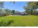 A wide backyard with a -proof pool fence and plenty of lawn at 315 E 6Th Ave, Windermere, FL 34786