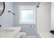 Elegant bathroom with a marble vanity, black fixtures, and tiled shower at 315 E 6Th Ave, Windermere, FL 34786