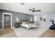 Main bedroom with neutral decor, wood floors, and ample space for relaxation at 315 E 6Th Ave, Windermere, FL 34786