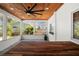 Cozy screened-in patio with wood ceiling and view of backyard at 315 E 6Th Ave, Windermere, FL 34786