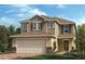 Charming two-story home featuring a two-car garage, classic shutters and a beautifully landscaped front yard at 3269 Rolling Plains Cir, Clermont, FL 34714