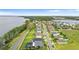 Neighborhood aerial view with beautiful water views at 3279 Landing Vw, Tavares, FL 32778