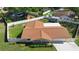 An aerial view features the property's layout, including the fenced yard and the home's roof at 333 Crystal Cir, Oviedo, FL 32765