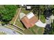 Aerial view of the property, showcasing the roof, driveway, and surrounding yard at 333 Crystal Cir, Oviedo, FL 32765