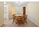 Cozy dining room featuring tile floors and a classic wooden dining set at 333 Crystal Cir, Oviedo, FL 32765
