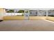 Enclosed patio space offering a view of the fenced backyard and a storage shed at 333 Crystal Cir, Oviedo, FL 32765