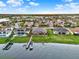 Aerial shot showcasing waterfront homes with docks, beautiful backyards, and a tranquil water setting at 3707 Paradiso Cir, Kissimmee, FL 34746