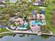 Aerial view of community clubhouse with pool, spa, and outdoor amenities at 3707 Paradiso Cir, Kissimmee, FL 34746