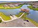 Overhead view of a boat ramp and dock area, offering convenient access to the lake for boating and recreation at 3707 Paradiso Cir, Kissimmee, FL 34746