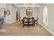 Dining room featuring decorative lighting, large window, and seating for six at 3707 Paradiso Cir, Kissimmee, FL 34746