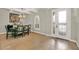 Bright dining room featuring a stylish light fixture and decorative accents at 3707 Paradiso Cir, Kissimmee, FL 34746