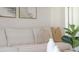 Close up on the sectional sofa and decorative pillows in the living room at 3739 Bluethread Way, Poinciana, FL 34759