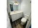 Modern bathroom with quartz countertop vanity and a toilet at 4100 Player Cir # 101, Orlando, FL 32808