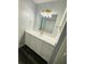 Bathroom features a vanity with white cabinets, modern countertops and gold fixtures at 4100 Player Cir # 101, Orlando, FL 32808
