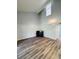 Spacious living room with high ceilings, modern floors and lots of natural light at 4100 Player Cir # 101, Orlando, FL 32808