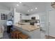 Open kitchen design with granite countertops and stainless steel appliances at 4321 Iveyglen Ave, Orlando, FL 32826