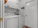Bright laundry room with modern washer and dryer at 4321 Iveyglen Ave, Orlando, FL 32826