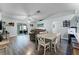 Open-concept living space with modern flooring and sliding glass doors to the patio at 4321 Iveyglen Ave, Orlando, FL 32826