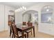 Elegant dining room featuring modern lighting and open access to other rooms at 4822 Lake Milly Dr, Orlando, FL 32839