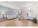 Bright living room with tile floors, accent wall, and ample natural light at 4822 Lake Milly Dr, Orlando, FL 32839