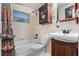 Bathroom with tile shower, vanity with sink, and cabinet at 4991 Tangerine Ave, Winter Park, FL 32792