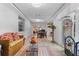 Open living room featuring tile floors and sliding glass doors at 4991 Tangerine Ave, Winter Park, FL 32792