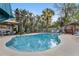 Enjoy this backyard pool and lush tropical landscaping, ideal for outdoor living and entertaining at 4991 Tangerine Ave, Winter Park, FL 32792