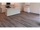 Open concept kitchen with white cabinets, modern appliances, and an island at 509 Coronado Cove Rd, New Smyrna Beach, FL 32168