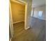 Walk-in closet with storage shelves at 5578 Metrowest Blvd # 305, Orlando, FL 32811