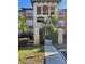 Inviting condo building featuring manicured landscaping and well-maintained facade at 5578 Metrowest Blvd # 305, Orlando, FL 32811