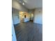 Bright living space featuring bar, kitchen, and natural lighting at 5578 Metrowest Blvd # 305, Orlando, FL 32811
