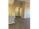 Open living space with bar, kitchen, and natural lighting at 5578 Metrowest Blvd # 305, Orlando, FL 32811