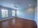 This is a bedroom boasting hardwood floors, closet, ample light, and neutral paint at 620 E Church St, Orlando, FL 32801