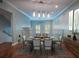 Dining room featuring modern decor, hardwood floors, and natural light at 620 E Church St, Orlando, FL 32801