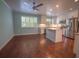 Bright kitchen with stainless steel appliances, granite countertops, and island with breakfast bar seating at 620 E Church St, Orlando, FL 32801