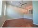 Bright living room with high ceilings, recessed lighting, wooden floors, and many windows at 620 E Church St, Orlando, FL 32801