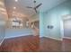 Spacious living room with an open floor plan, high ceilings, and modern railing at 620 E Church St, Orlando, FL 32801