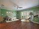 Cozy main bedroom with bay window, plantation shutters, and modern furnishings at 620 E Church St, Orlando, FL 32801