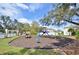 Well-maintained community playground with slides, swings, and play equipment at 6613 Duncaster St, Windermere, FL 34786
