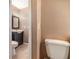 Bathroom with toilet and vanity in need of renovation at 7906 Rideout Rd, Riverview, FL at 7906 Arabian Pl, Orlando, FL 32818