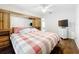 Spacious bedroom featuring a television and a built in headboard at 11512 Grand Bay Blvd, Clermont, FL 34711