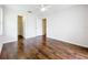 Bright bedroom with hardwood floors, two closets and neutral walls at 11512 Grand Bay Blvd, Clermont, FL 34711