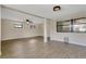 Finished basement featuring plank flooring, windows, and a ceiling fan at 1203 Judy Ave, Tavares, FL 32778
