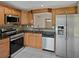 Updated kitchen with stainless steel appliances, granite countertops, and attractive backsplash at 126 Maitland Ave # 126, Altamonte Springs, FL 32701