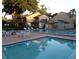 Beautiful community pool surrounded by lush greenery, offering a relaxing and refreshing experience at 126 Maitland Ave # 126, Altamonte Springs, FL 32701